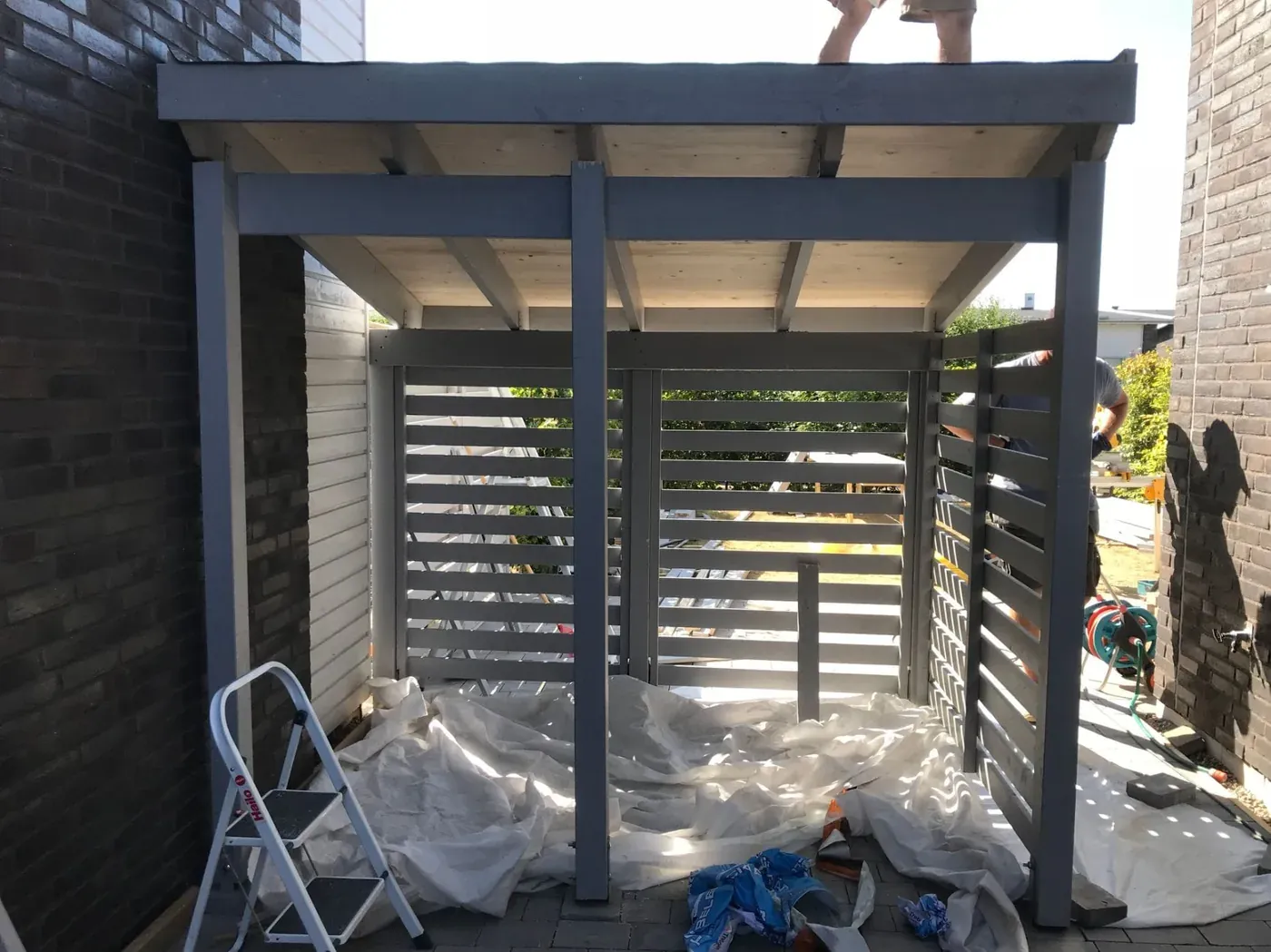 Carport och cykelskjul – Hjärup. Utfört av Wood & Stone.