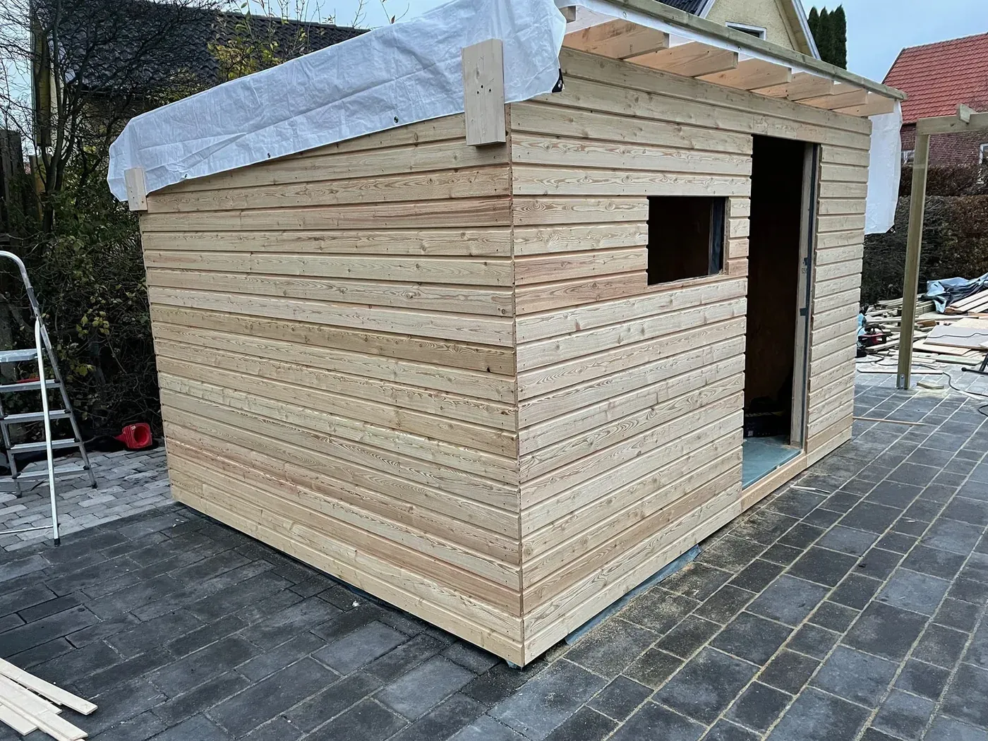 Förråd och anläggning i Lund – Lund. Utfört av Wood & Stone.